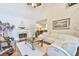 Bright living room featuring a cozy fireplace and comfortable seating at 4241 Hampton Mill Pkwy, Douglasville, GA 30135