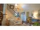Bright living room featuring a staircase, comfortable seating, and stylish decor; perfect for relaxation and entertaining at 4241 Hampton Mill Pkwy, Douglasville, GA 30135