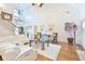 Spacious living room with vaulted ceilings, hardwood floors, and staircase at 4241 Hampton Mill Pkwy, Douglasville, GA 30135