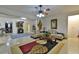 Open living room with tile floors, sofas, decorative rugs, and easy access to the closet, for a stylish and relaxed atmosphere at 4241 Hampton Mill Pkwy, Douglasville, GA 30135
