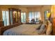 Serene main bedroom with a comfortable bed, natural light, and a workspace at 4241 Hampton Mill Pkwy, Douglasville, GA 30135