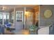 Charming covered patio featuring comfortable seating, stylish decor, and an inviting outdoor space for relaxation and entertainment at 4241 Hampton Mill Pkwy, Douglasville, GA 30135