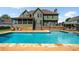 This home features a lovely swimming pool and outdoor living space at 5585 Lavender Farms Rd, Powder Springs, GA 30127