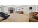 Finished basement featuring neutral carpet, gaming chairs, and a cozy seating area for entertaining at 5585 Lavender Farms Rd, Powder Springs, GA 30127