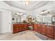 Bright bathroom with double vanity, granite countertops, and decorative lighting at 5585 Lavender Farms Rd, Powder Springs, GA 30127
