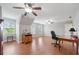 Bright bonus room with two ceiling fans, hardwood floors, and lots of space at 5585 Lavender Farms Rd, Powder Springs, GA 30127