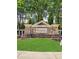 Renaissance at Southpark stone community entrance with well-manicured landscaping at 7710 Bucknell Terrace, Fairburn, GA 30213