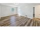Spacious bedroom filled with natural light, featuring sleek floors and neutral walls at 1596 Allgood Rd, Stone Mountain, GA 30083
