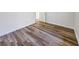 Bedroom with sleek flooring, neutral walls, and natural light, offering a versatile space at 1596 Allgood Rd, Stone Mountain, GA 30083