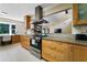 Well-equipped kitchen with granite countertops, a central island, and ample storage space at 195 Pine Trail Rd, Fayetteville, GA 30214