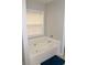 Bright bathroom with corner tub and window, for a tranquil space at 2481 Southhaven Ln, Buford, GA 30519