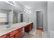 Bathroom with double sink vanity, large mirror, and separate shower/tub at 2481 Southhaven Ln, Buford, GA 30519