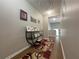 Hallway featuring a console table with decorative items and modern decor at 2481 Southhaven Ln, Buford, GA 30519