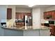Kitchen with granite countertops, stainless steel appliances, and wood cabinets at 2481 Southhaven Ln, Buford, GA 30519