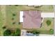 Aerial view of home with a well manicured lawn, patio, and long driveway at 5345 Glenhaven Dr, Cumming, GA 30041