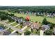 A tranquil neighborhood with lush green spaces and well-maintained homes, located near a golf course at 5345 Glenhaven Dr, Cumming, GA 30041