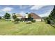 Beautiful backyard featuring a well-manicured lawn and mature trees at 5345 Glenhaven Dr, Cumming, GA 30041