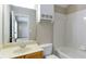 Bright bathroom with vanity, toilet, and shower/tub combo at 5345 Glenhaven Dr, Cumming, GA 30041