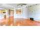 Spacious living room with hardwood floors, recessed lighting, decorative columns, and neutral color palette at 5345 Glenhaven Dr, Cumming, GA 30041