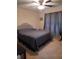 Neutral bedroom featuring a comfortable queen bed and soft natural light at 969 Golden Meadows Ln, Loganville, GA 30052