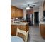 Functional kitchen with stainless steel appliances and light oak cabinetry at 969 Golden Meadows Ln, Loganville, GA 30052