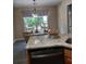 Cozy kitchen nook with granite counters and backyard view at 969 Golden Meadows Ln, Loganville, GA 30052