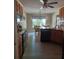 Open concept kitchen with granite counters and black appliances at 969 Golden Meadows Ln, Loganville, GA 30052