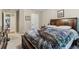 Comfortable bedroom with a queen bed, dresser, and a light-filled ambiance at 358 Nature Brook Se Walk, Smyrna, GA 30082