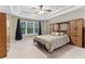 Large main bedroom featuring trey ceilings, carpeted floors, and great natural light at 358 Nature Brook Se Walk, Smyrna, GA 30082