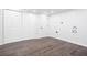 Finished basement with doors and wood-style flooring plus hookups for a washer and dryer at 5491 Hiram Rd, Powder Springs, GA 30127
