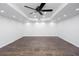 A spacious room with recessed lighting, a ceiling fan, and wood-style flooring, in the basement at 5491 Hiram Rd, Powder Springs, GA 30127