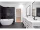 Beautiful bathroom with a soaking tub and double sink vanity with modern fixtures at 5491 Hiram Rd, Powder Springs, GA 30127