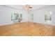 Bright bedroom featuring hardwood floors, neutral paint, and a window seat at 5491 Hiram Rd, Powder Springs, GA 30127