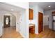 Inviting entryway featuring hardwood floors and entry to the kitchen at 5491 Hiram Rd, Powder Springs, GA 30127