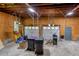 Two-car garage with plywood walls and doors at 5491 Hiram Rd, Powder Springs, GA 30127