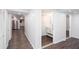 Hallway view featuring modern fixtures and stainless steel refrigerator at 5491 Hiram Rd, Powder Springs, GA 30127