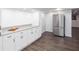 Bright kitchen featuring stainless steel refrigerator and ample counter space at 5491 Hiram Rd, Powder Springs, GA 30127