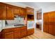 Traditional style kitchen with wood cabinets, granite countertops, and stainless steel appliances at 5491 Hiram Rd, Powder Springs, GA 30127