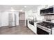 Modern kitchen featuring stainless steel appliances and spacious layout at 5491 Hiram Rd, Powder Springs, GA 30127