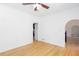 Bright room featuring neutral paint, hardwood floors, crown molding, and a ceiling fan at 5491 Hiram Rd, Powder Springs, GA 30127