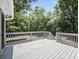 Deck with wooden floor and railings offering a pleasant outdoor space at 990 Trestle Dr, Austell, GA 30106