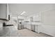 Functional kitchen with white cabinets, stainless steel appliances, and modern countertops at 990 Trestle Dr, Austell, GA 30106