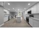 Modern kitchen featuring white cabinets, stainless appliances, and a functional island at 3267 Sunderland Dr, Snellville, GA 30039