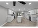 Modern kitchen featuring white cabinets, stainless appliances, subway tile backsplash, and island at 3267 Sunderland Dr, Snellville, GA 30039