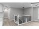 Open loft area with new flooring, modern lighting, and neutral paint for a clean, contemporary look at 3267 Sunderland Dr, Snellville, GA 30039
