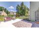 Charming back deck and yard offers a serene outdoor escape, perfect for relaxation and entertainment at 3370 Battlement Cir, Loganville, GA 30052