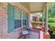 Cozy front porch with seating area, providing a welcoming entrance to the home at 3370 Battlement Cir, Loganville, GA 30052
