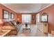 Cozy living room with a plush sofa, soft lighting, and view to foyer at 3370 Battlement Cir, Loganville, GA 30052
