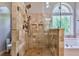 Tile shower featuring bronze fixtures at 4167 Alayna Lee Cir, Mcdonough, GA 30252