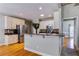 Well-lit kitchen featuring stainless steel appliances and a breakfast bar at 4167 Alayna Lee Cir, Mcdonough, GA 30252